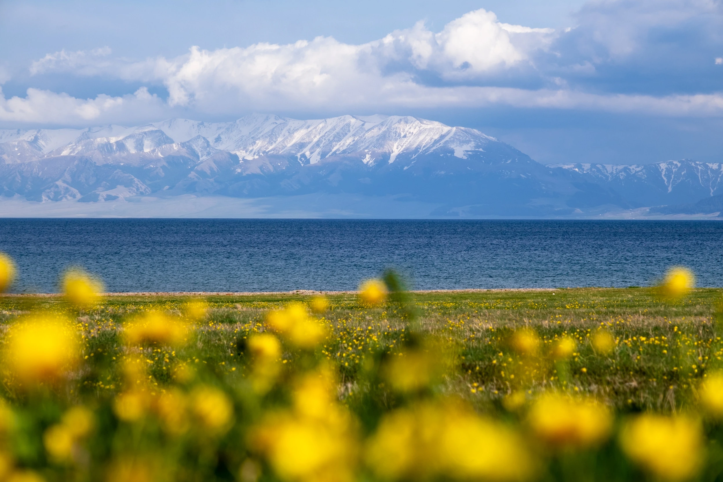 Sayram Lake beneath mountain ranges in Xinjiang